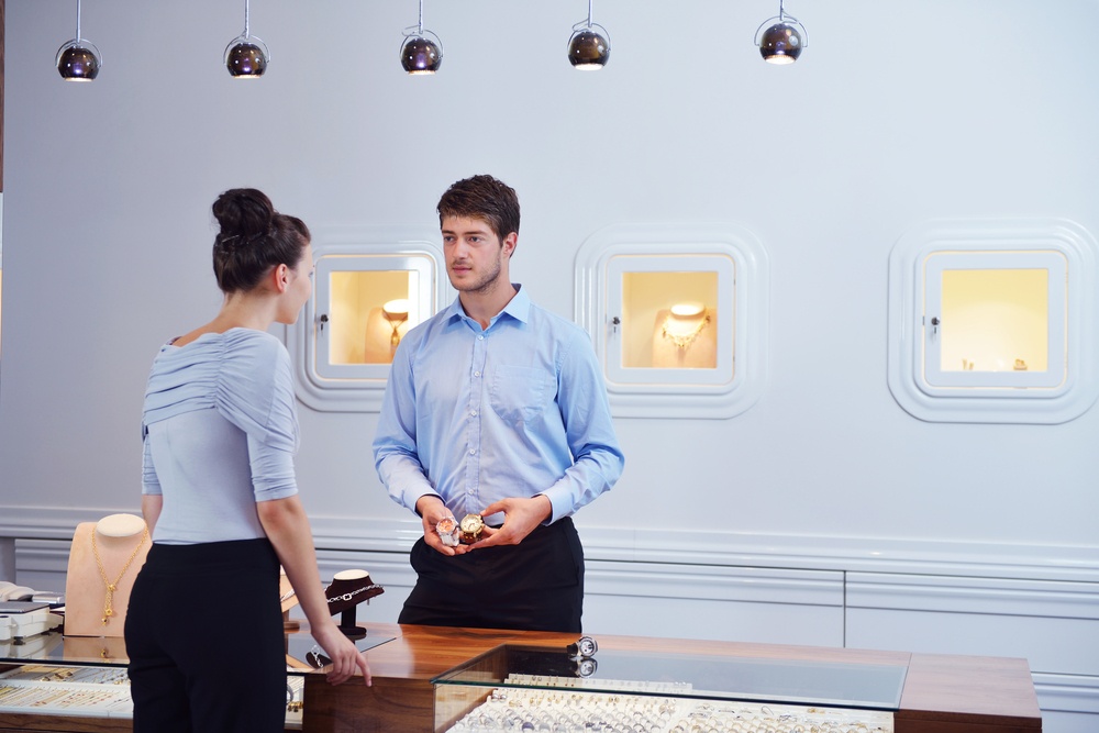 business man selling in jewelry store.jpeg