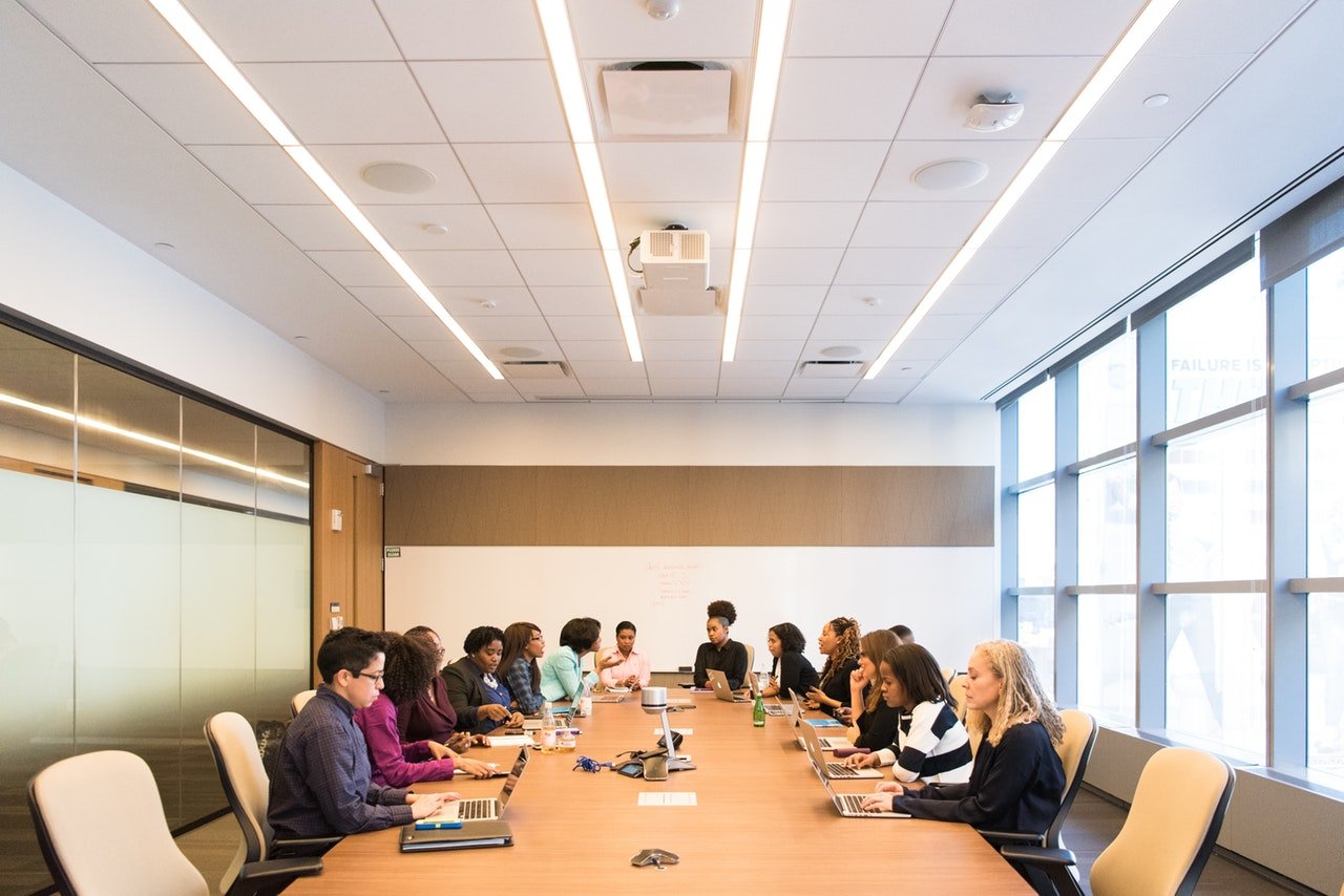 group-of-people-in-conference-room-1181304